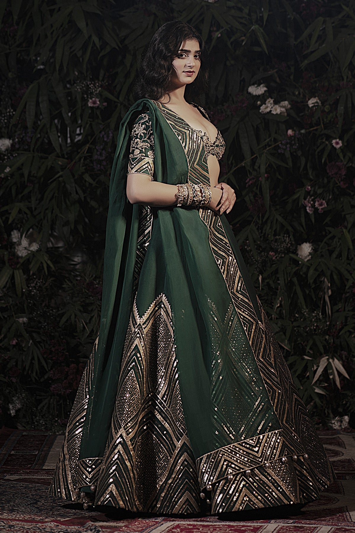 A emerald green raw silk lehenga