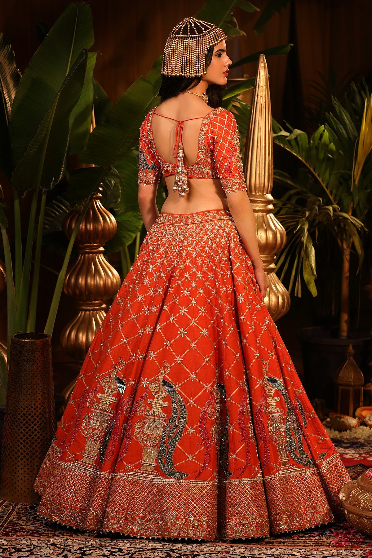 Our Mesmerizing Orange Raw Silk Lehenga.