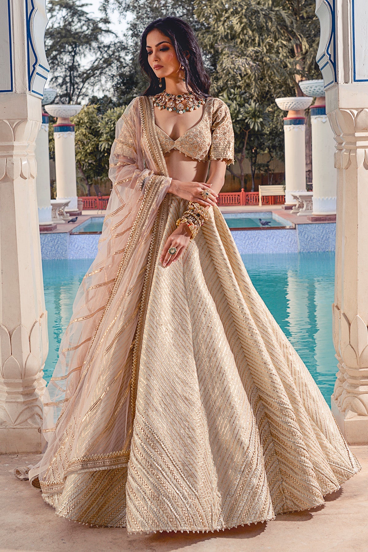 A Traditional Ivory Kasab Silk Lehenga