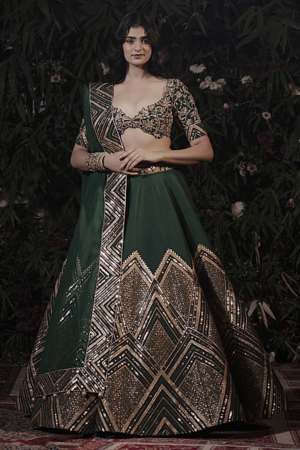 A emerald green raw silk lehenga