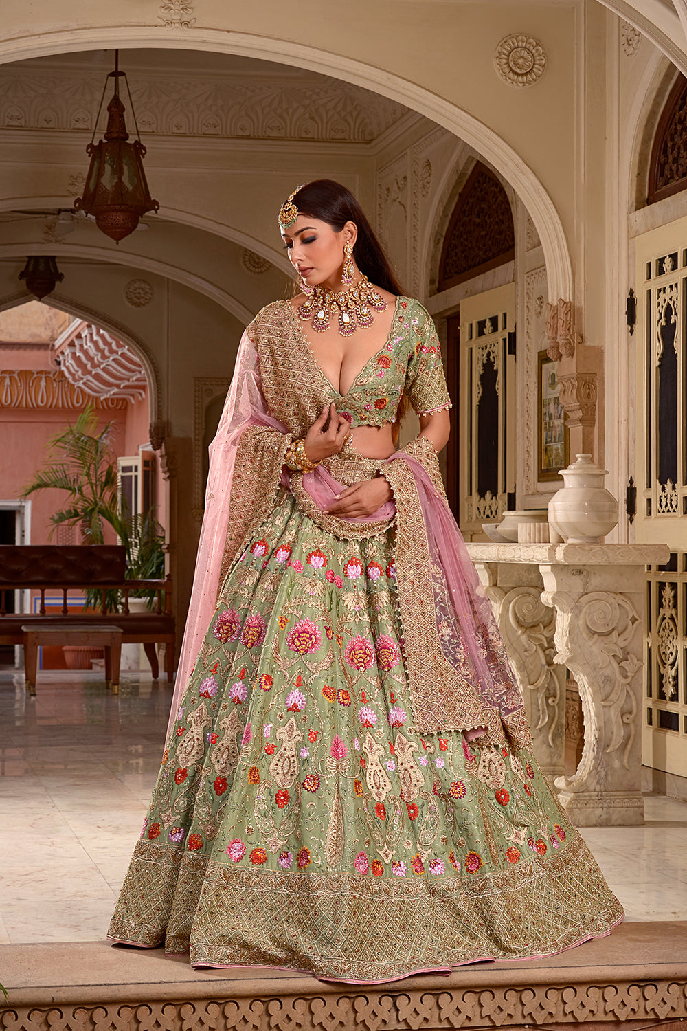 A Pista Green And Soft Pink Lehenga