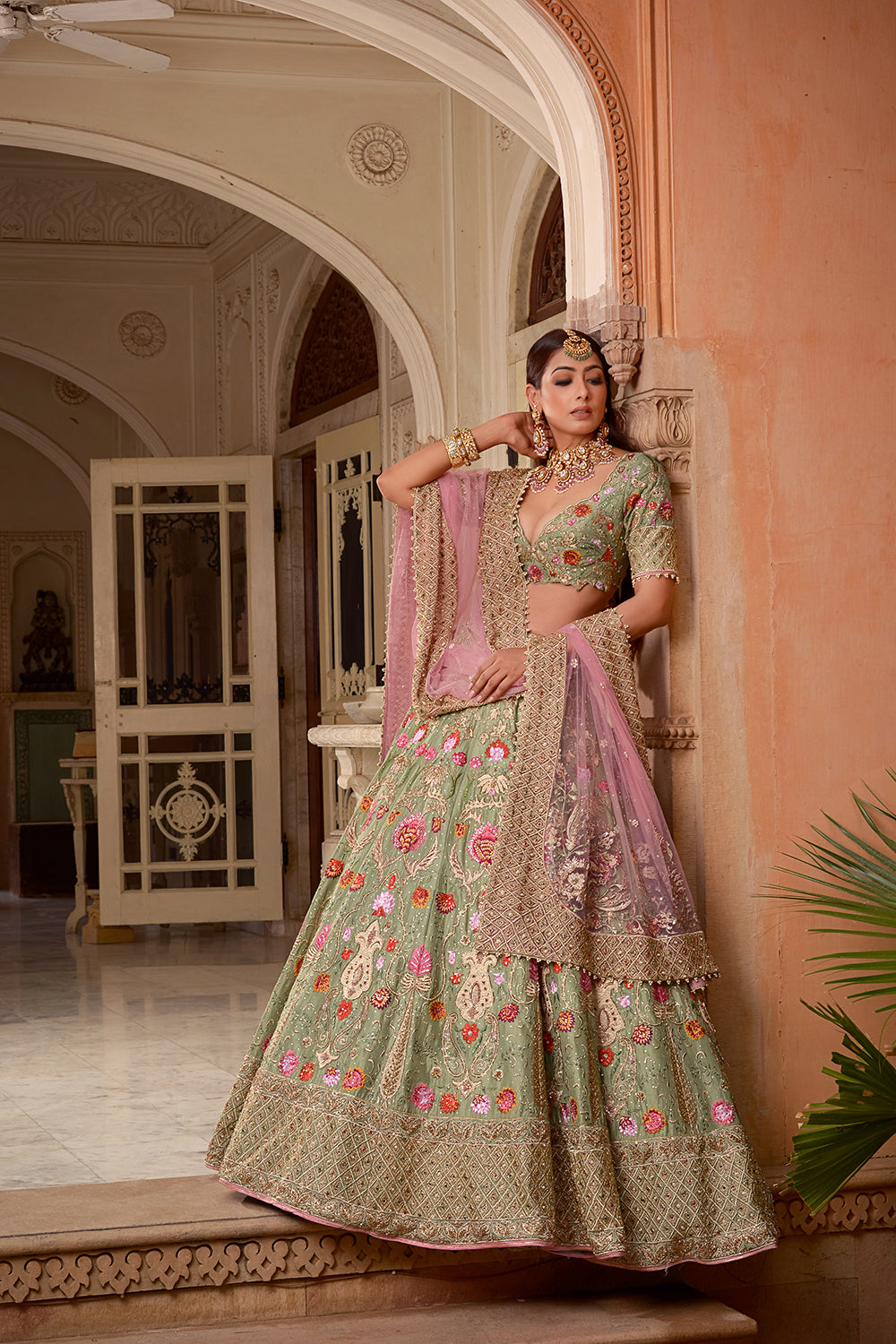 A Pista Green And Soft Pink Lehenga