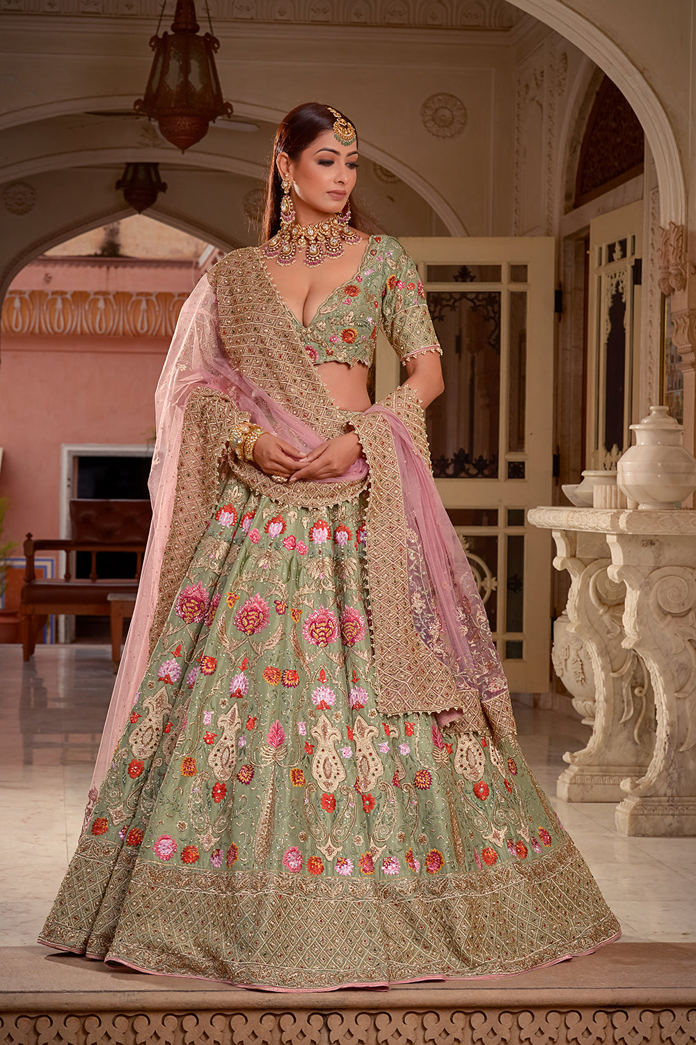 A Pista Green And Soft Pink Lehenga