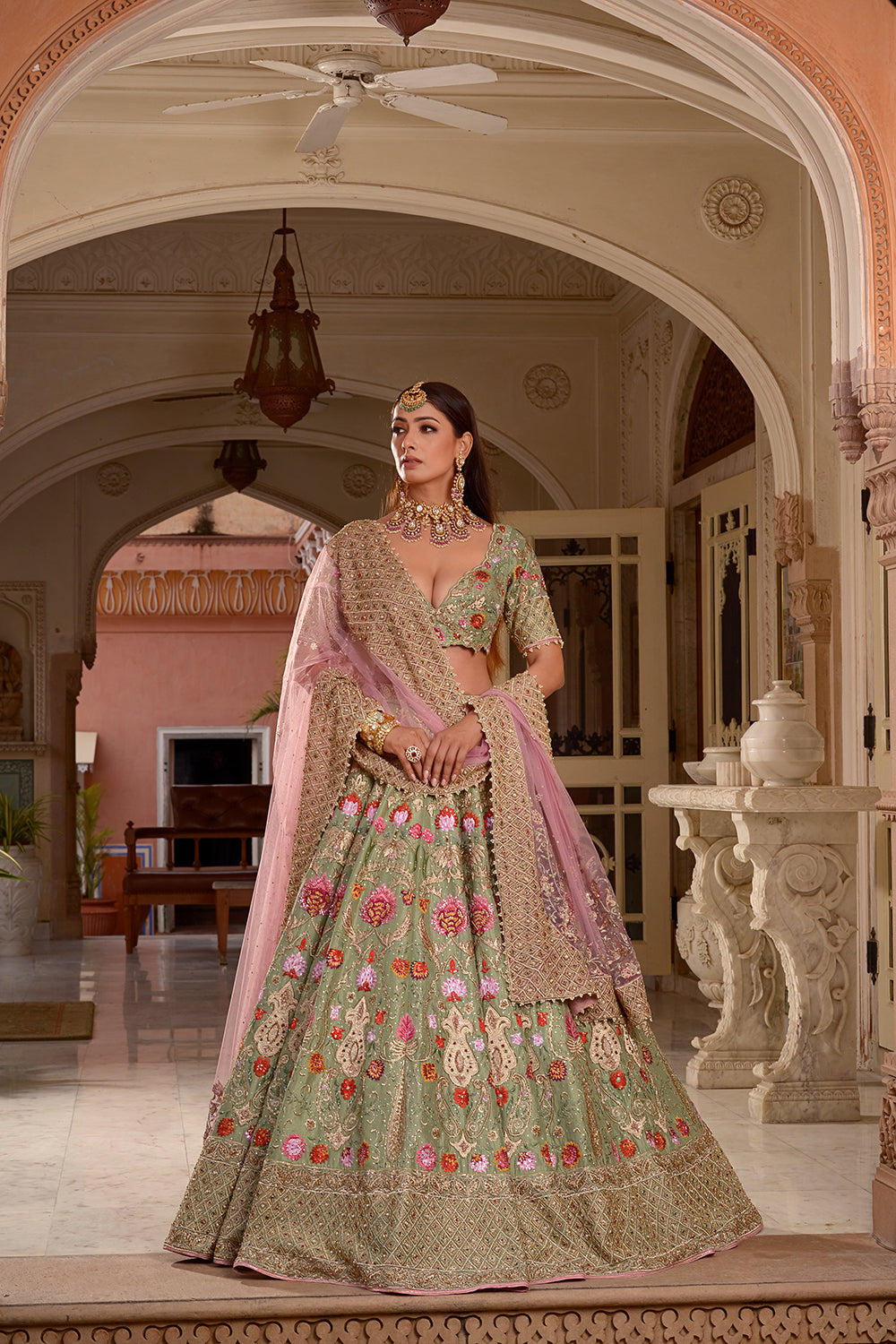 A Pista Green And Soft Pink Lehenga