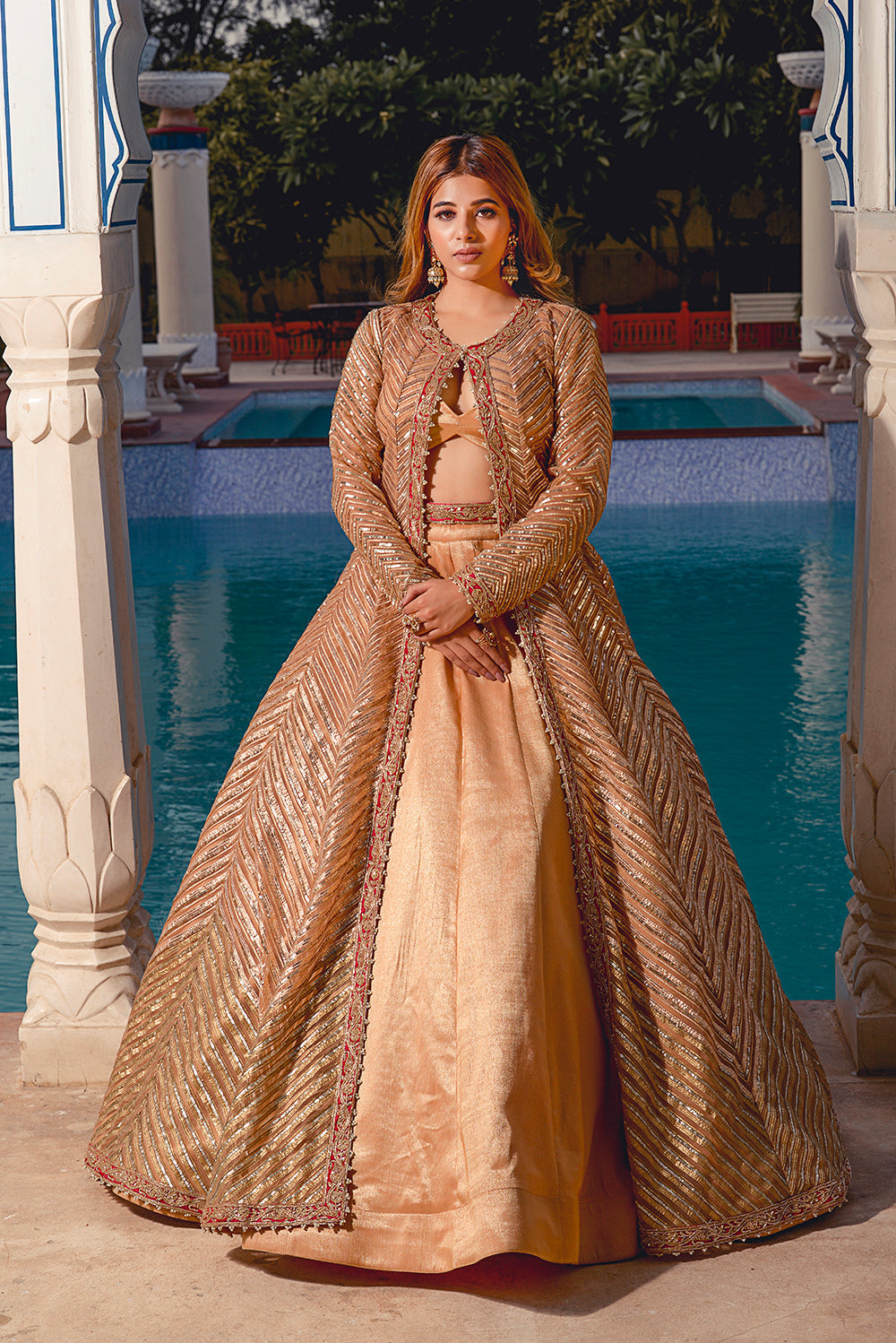 An Amber Gold Tulle Jacket And Kasab Silk Blouse And Lehenga