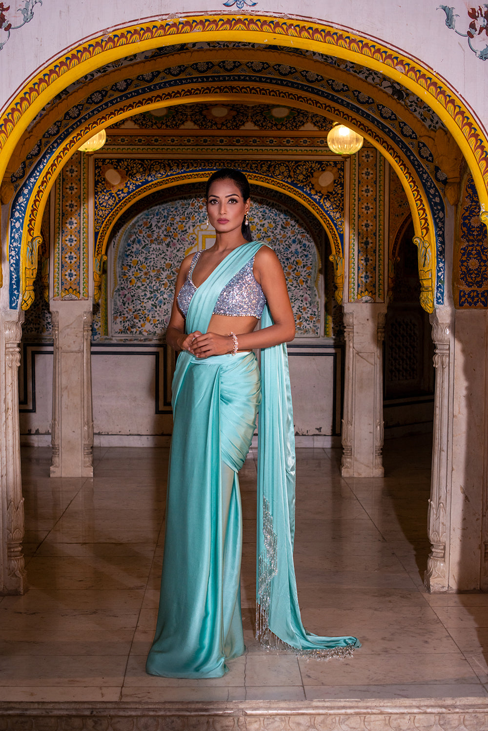 An Ice Blue Satin Silk Draped Saree